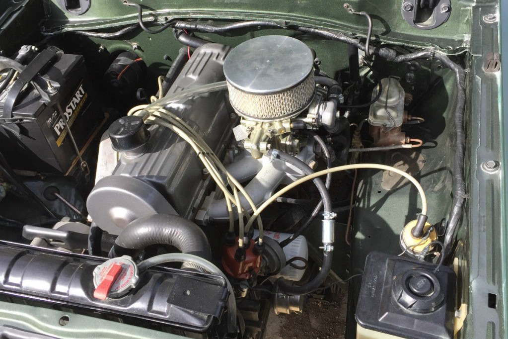 It features a new carburetor on the original 2.0 liter engine and an afterm...