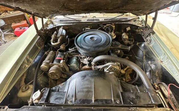 Engine bay of a 1969 Pontiac Tempest Custom S with Pontiac 350 V8