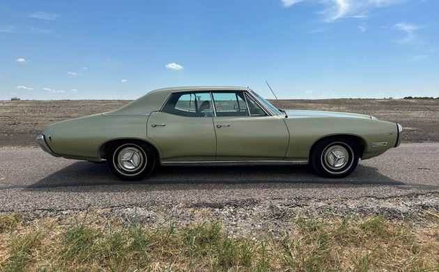 1969 Pontiac Tempest Custom S four-door hardtop showing passenger side and vent window